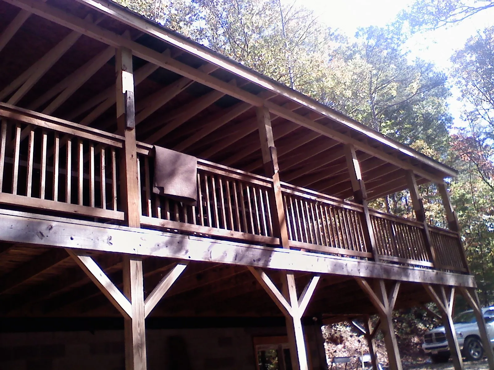Timber framing under a new elevated porch and deck — Roof Leak Repair in Slayden by Roofing Brothers